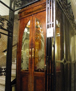 Antique elevator with wooden doors